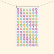 Towel with colorful 'Happy Easter' egg pattern on a white background