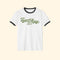 White t-shirt with green text 'Team Algae 8647' on a white background