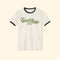 White t-shirt with green text 'Team Algae 8647' on a white background