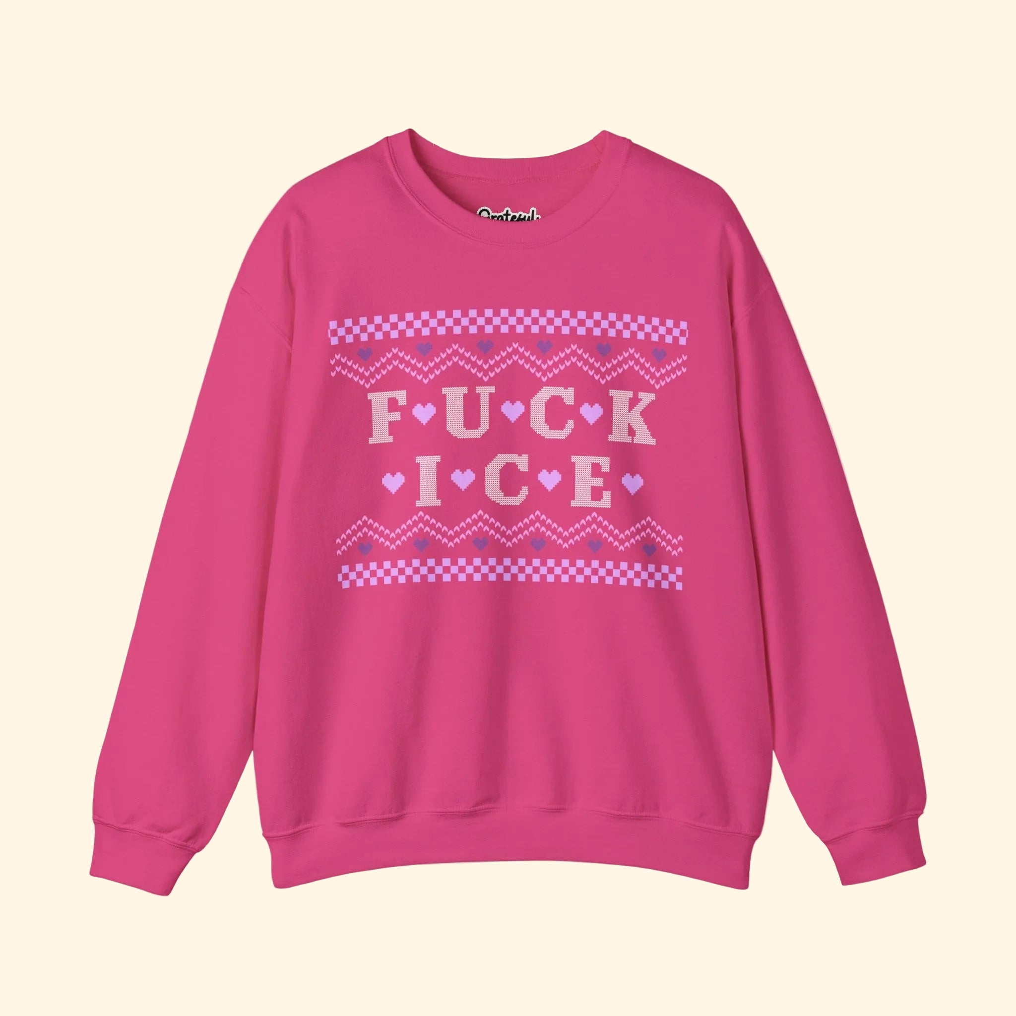 Pink sweatshirt with graphic text on a white background