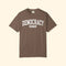 Brown t-shirt with 'DEMOCRACY EST 1776' text on a white background