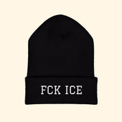 Black beanie with 'FCK ICE' text on a white background
