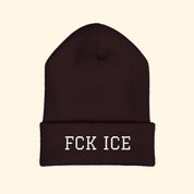 Brown beanie with 'FCK ICE' text on a white background