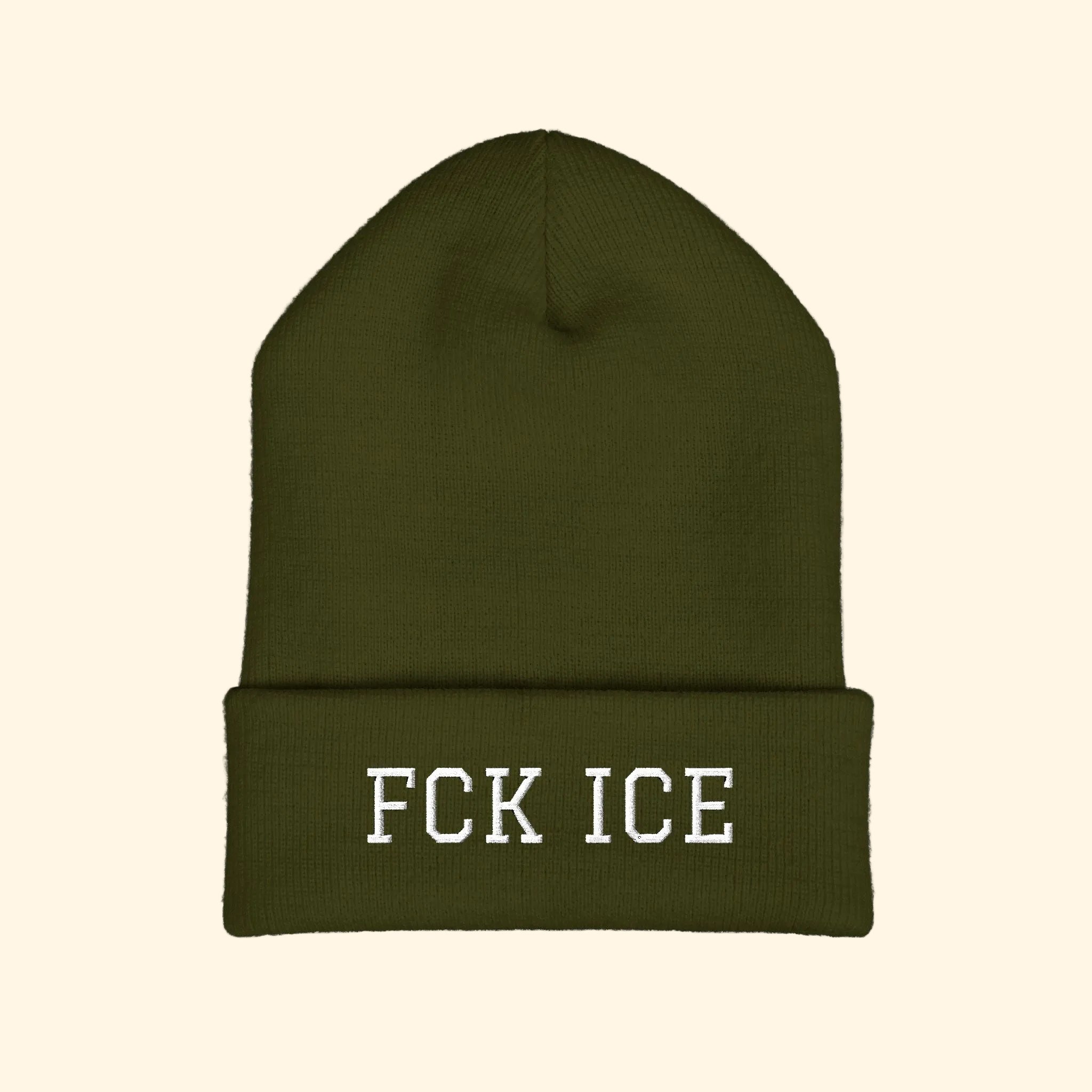 Green beanie with 'FCK ICE' text on a white background
