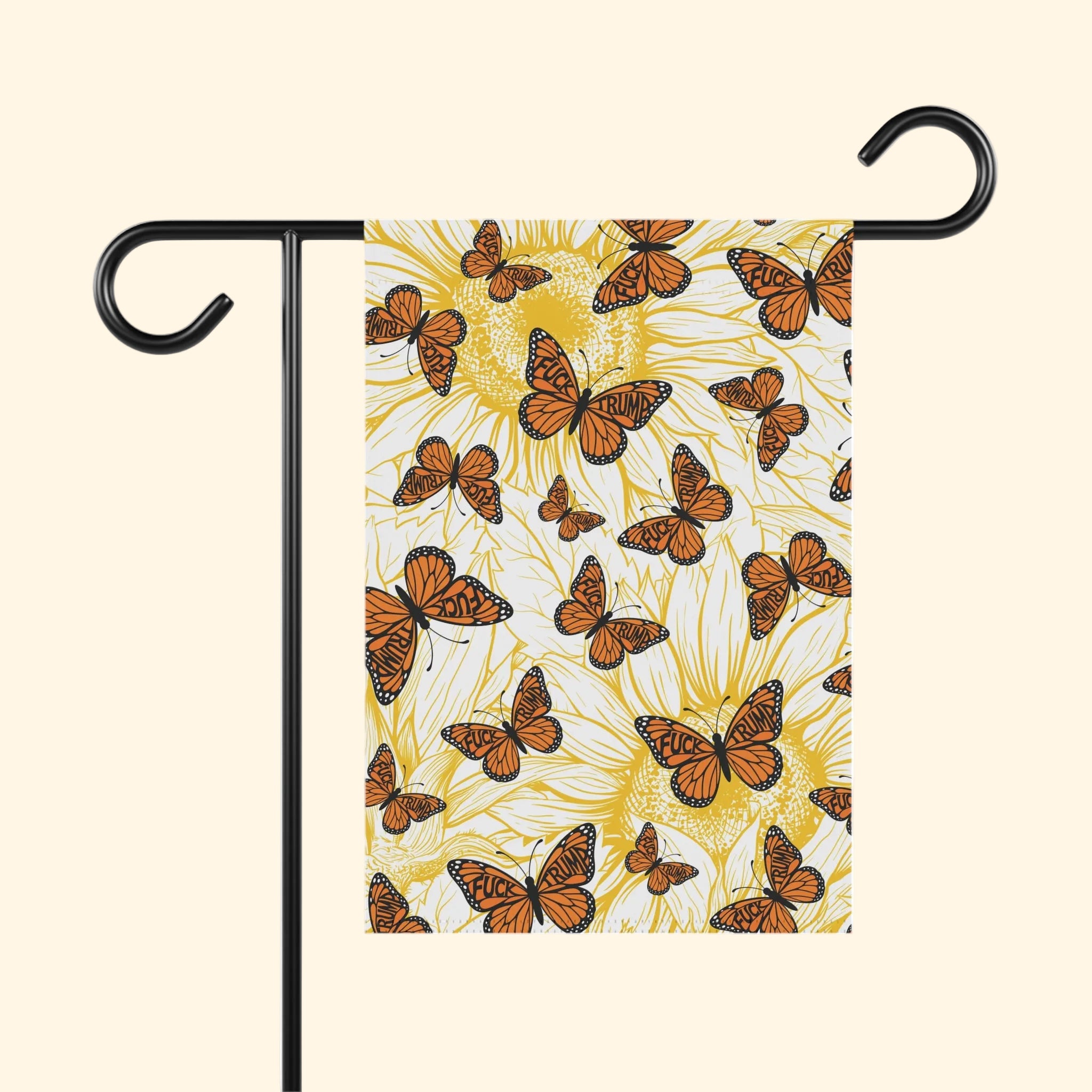 Garden flag with butterfly design on a white background