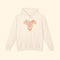Beige hoodie with floral design and text on a white background