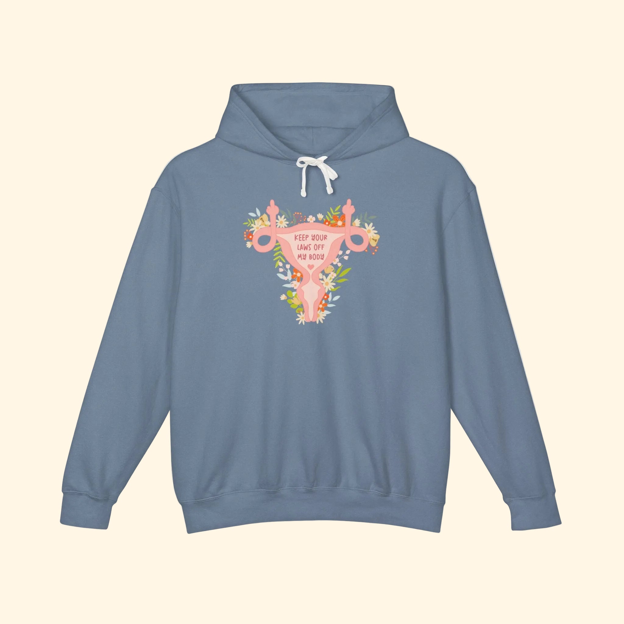 Blue hoodie with a floral uterus graphic on a white background