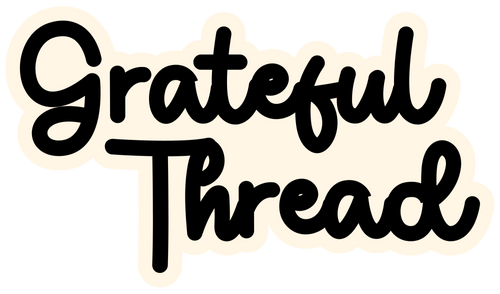 Logo of 'Grateful Thread' with black text on a white background