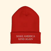 Red beanie with 'Make America Kind Again' text on a white background