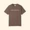 Brown t-shirt with text on a white background